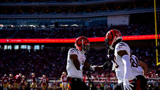 Cincinnati Bengals wide receiver Ja'Marr Chase (1) high fives Cincinnati Bengals wide receiver Tyler Boyd (83) after Cincinnati Bengals wide receiver Tyler Boyd (83) scored a touchdown in the first quarter of the NFL game between the Cincinnati Bengals and the San Francisco 49ers at Levi Stadium in Santa Clara, Calif., on Sunday, Oct 29, 2023.  